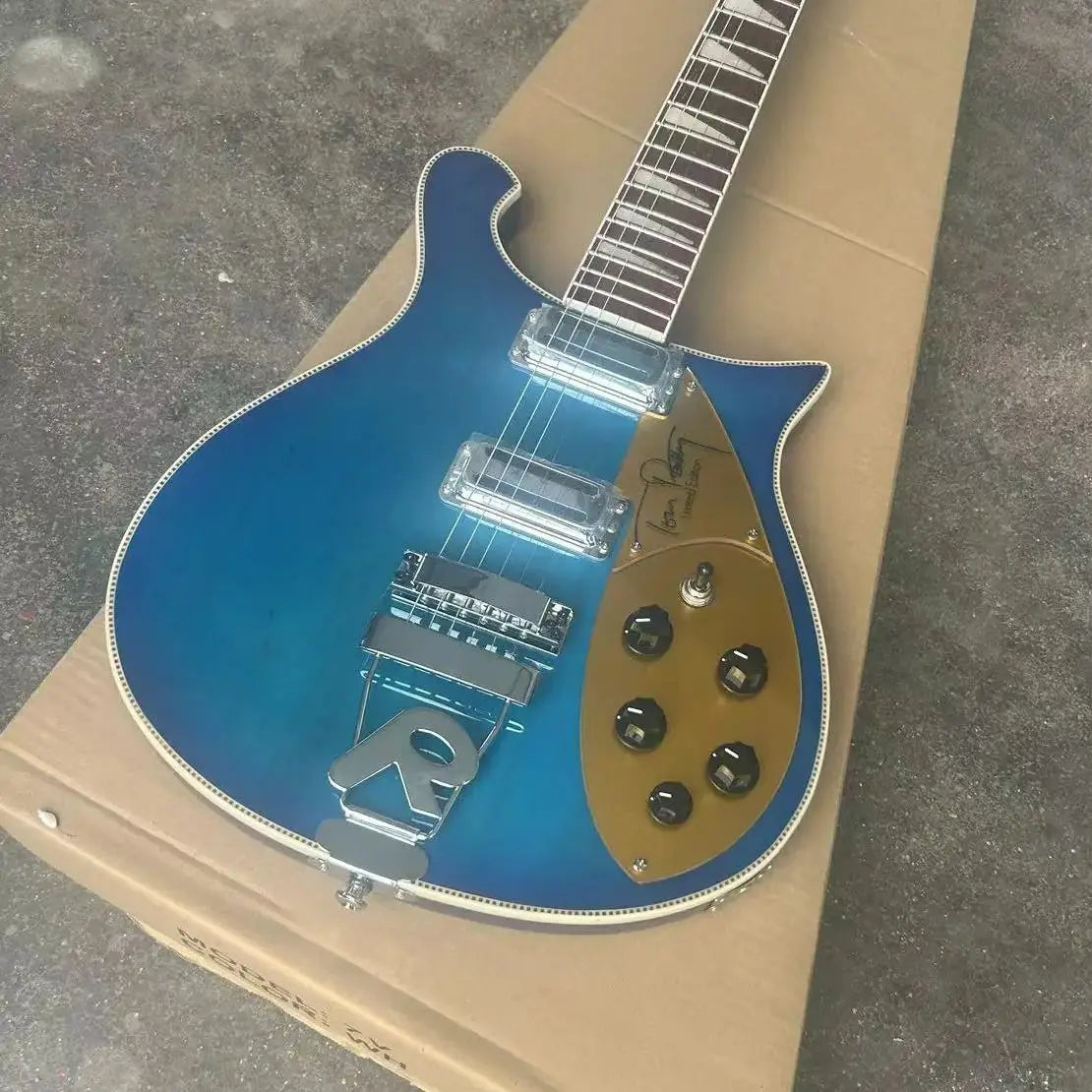 Wavy Blue Electric Guitar with Gold Pickup