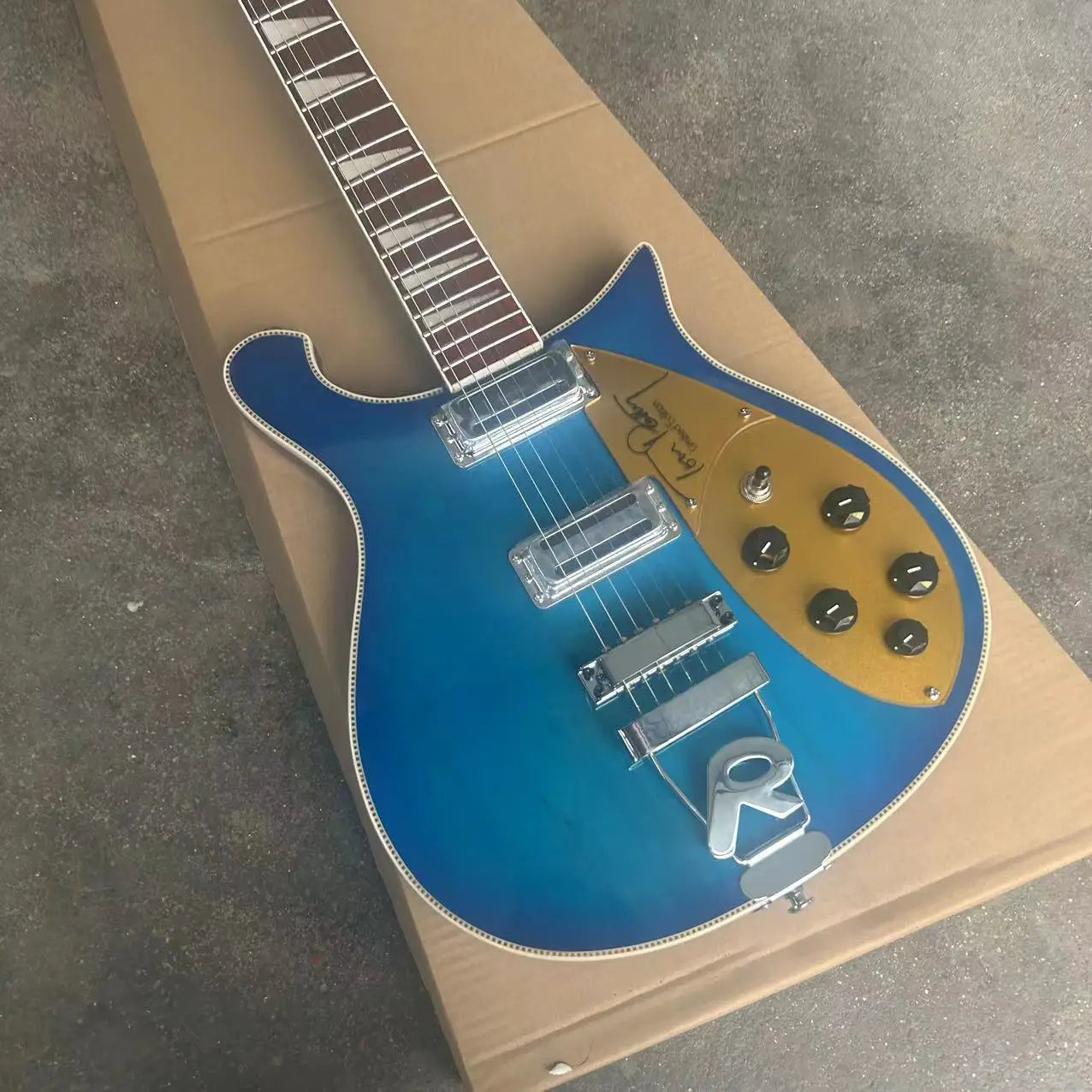 Wavy Blue Electric Guitar with Gold Pickup